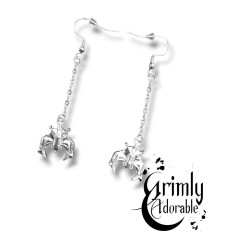 boucles d’oreilles goth animaux totem